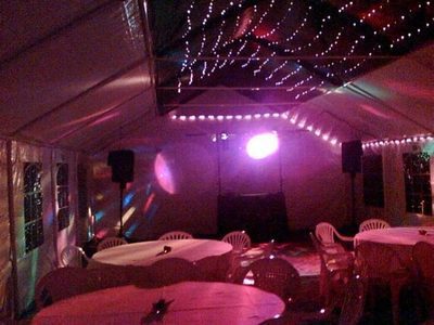 marquee with starlight lining and rope light