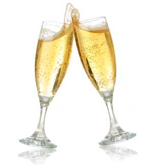 Two full champagne glasses