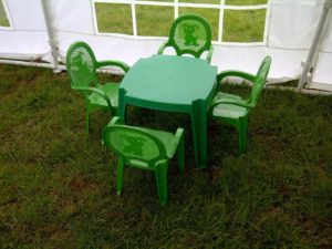 Green child's table with four chairs