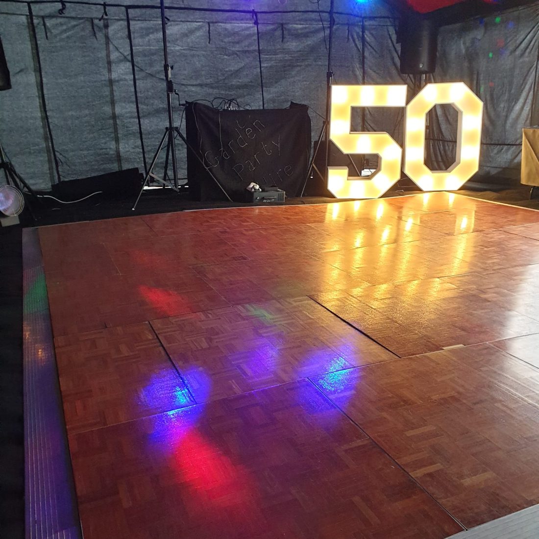 50th birthday party in a marquee with full disco rig, lights, lasers and dance floor